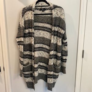 Knee length grey sweater